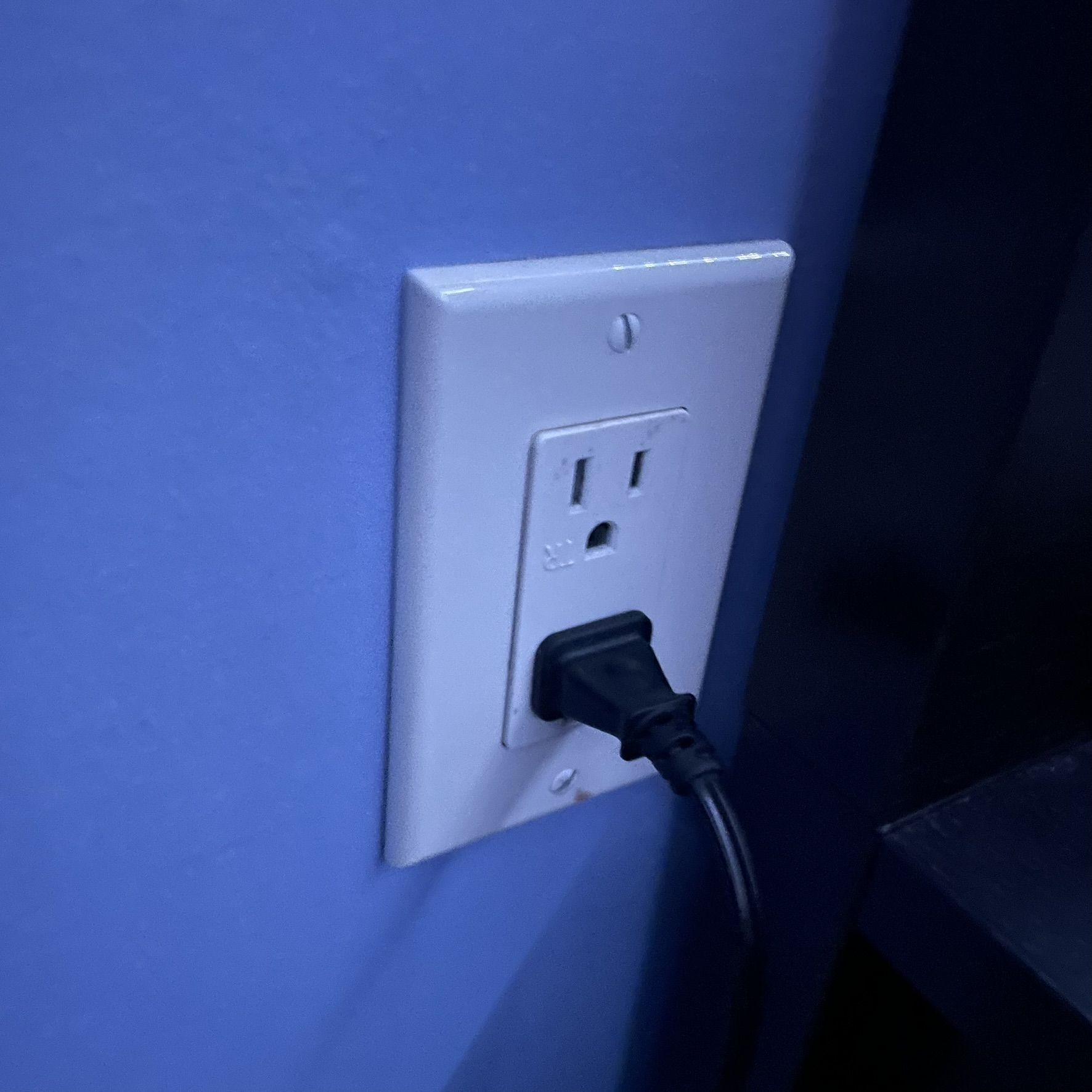 This is an electrical outlet and the sound of a plug being inserted and taken out