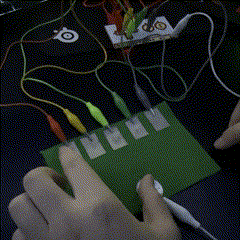 This is the fourth circuit, similar to the previous but I am using conductive fabric as the connections and a quarter for the ground, the base material for the circuit is fabric, used just to try out another material rather than paper or cardboard.